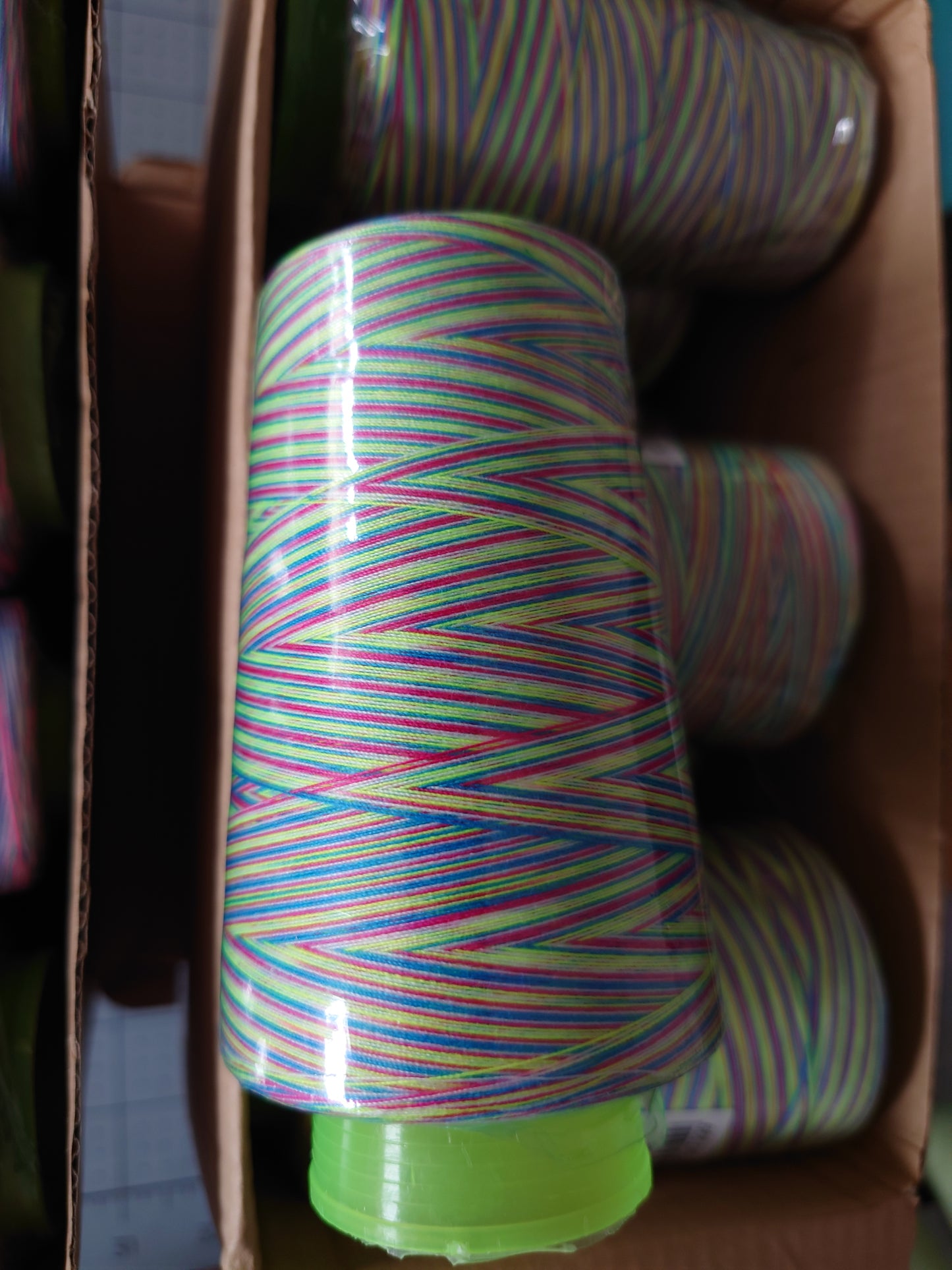Green/red/blue/white variegated overlocker cones - 111