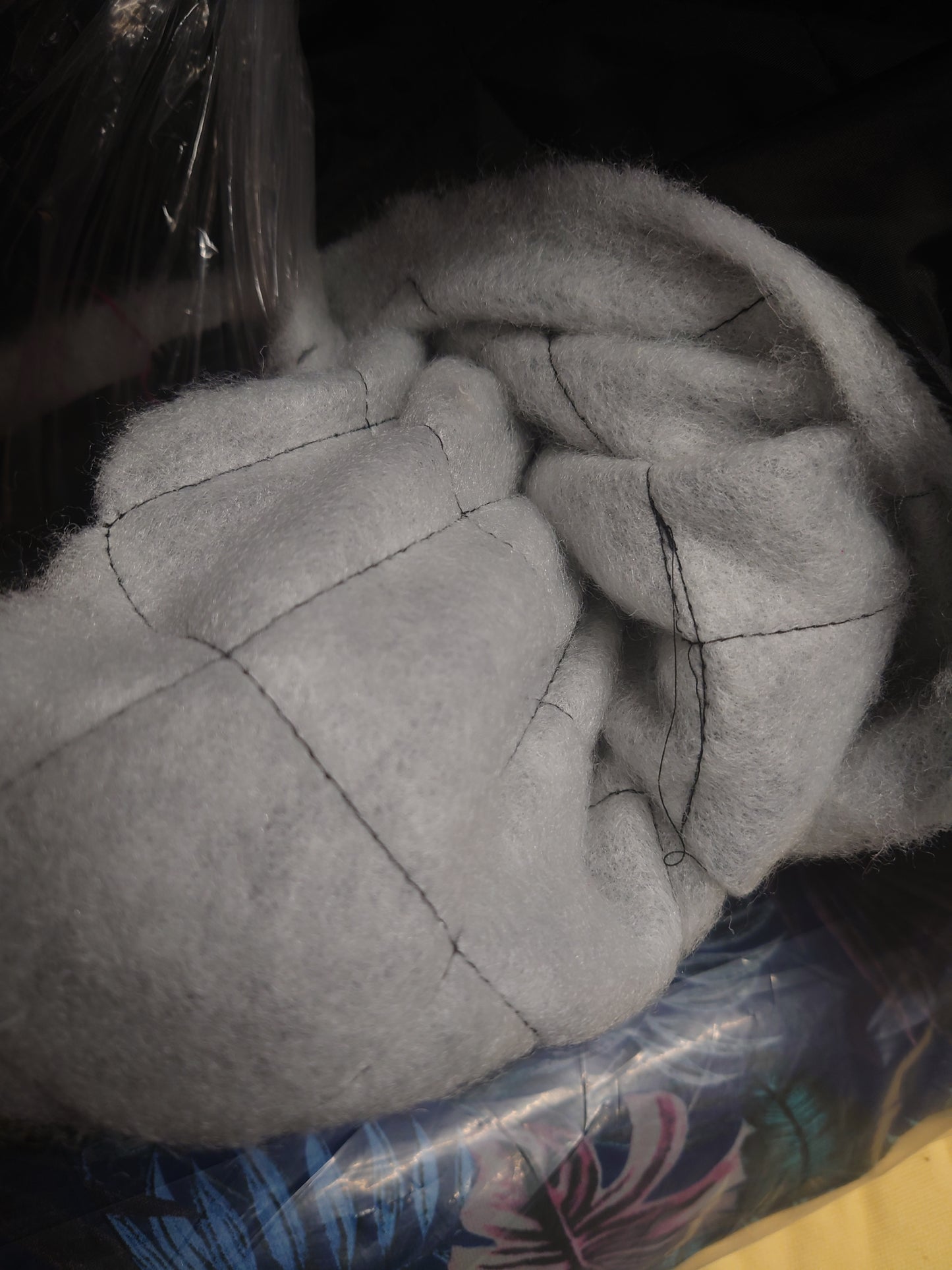 Quilted black shiny fabric