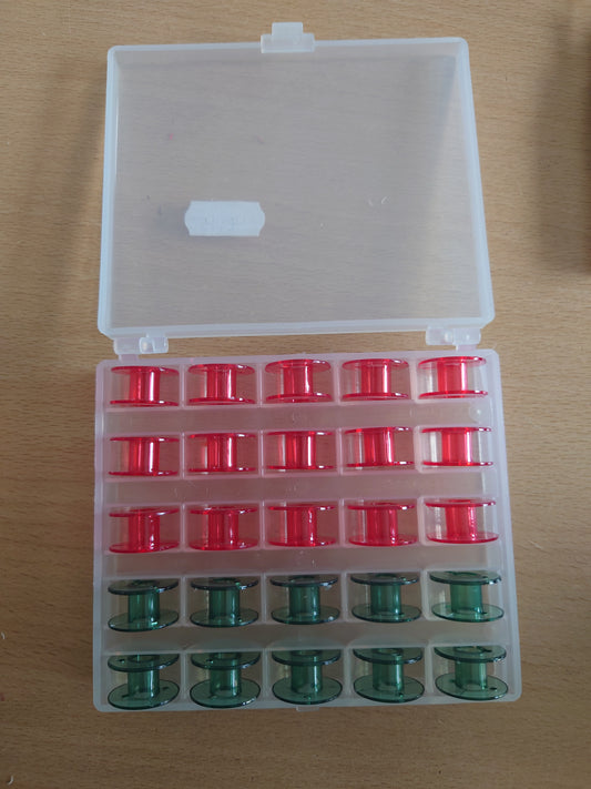 25 Empty Bobbins in Case