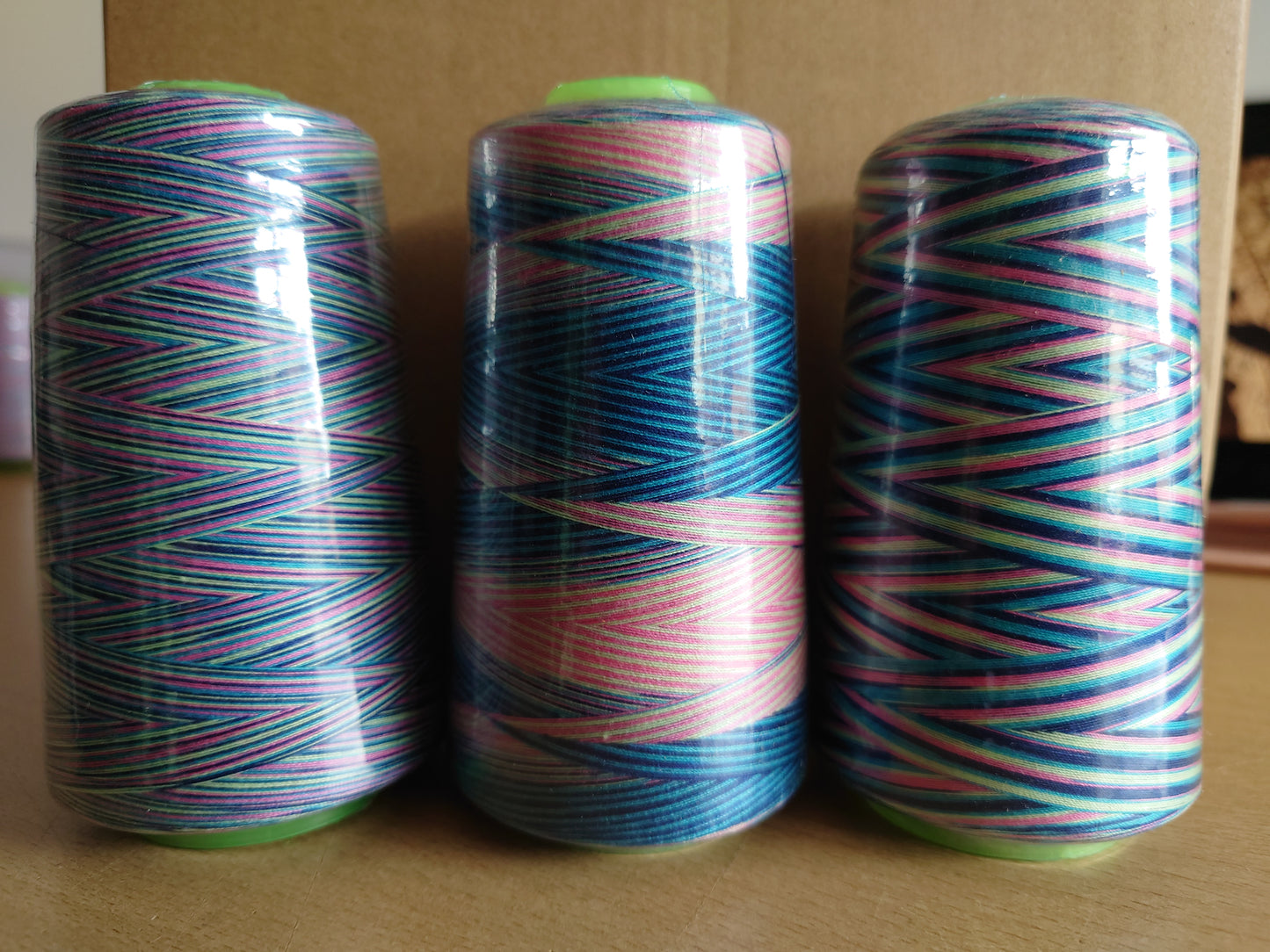 Pink/blue/green variegated overlocker cones - 115