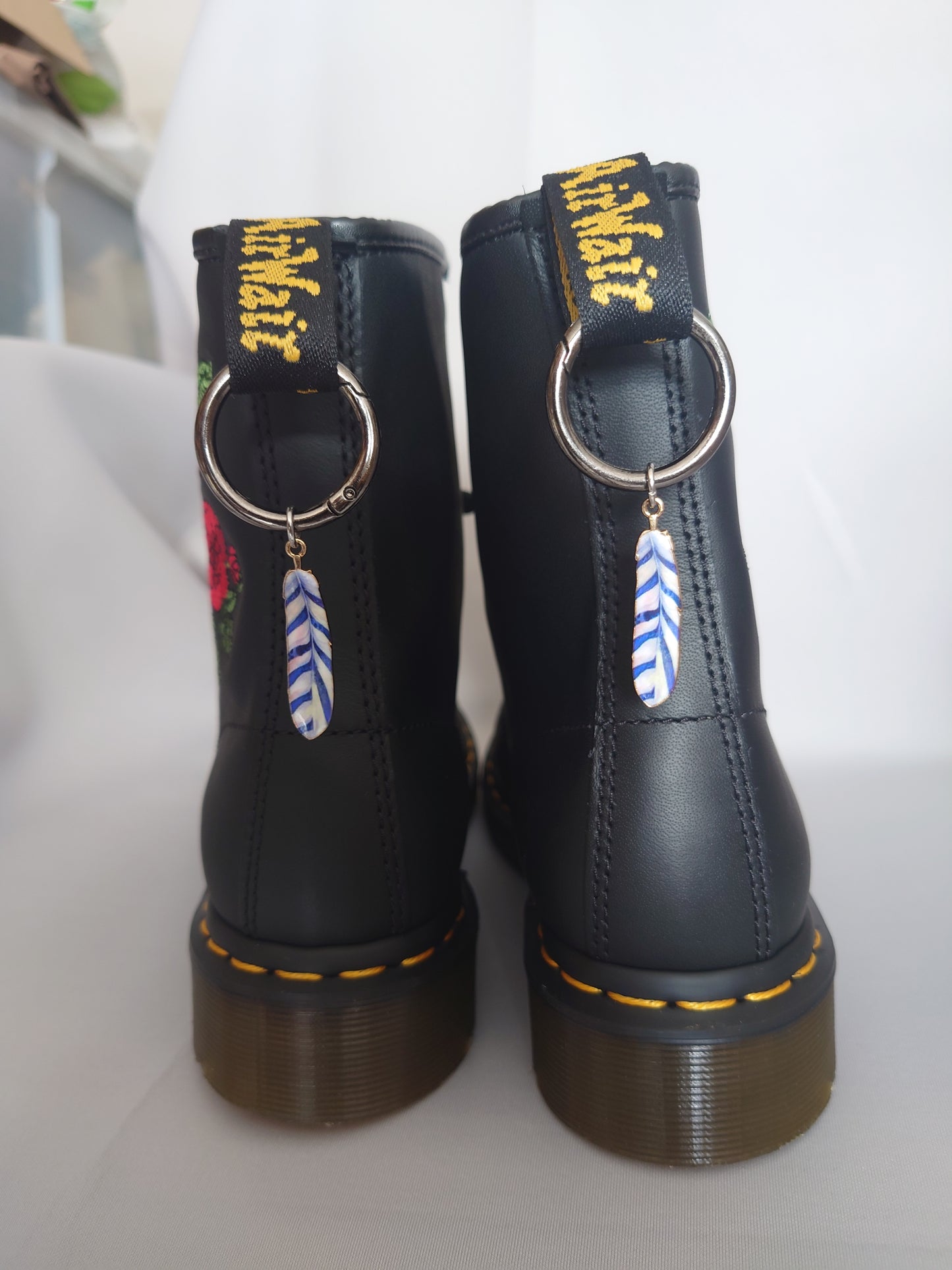Feather boot charms