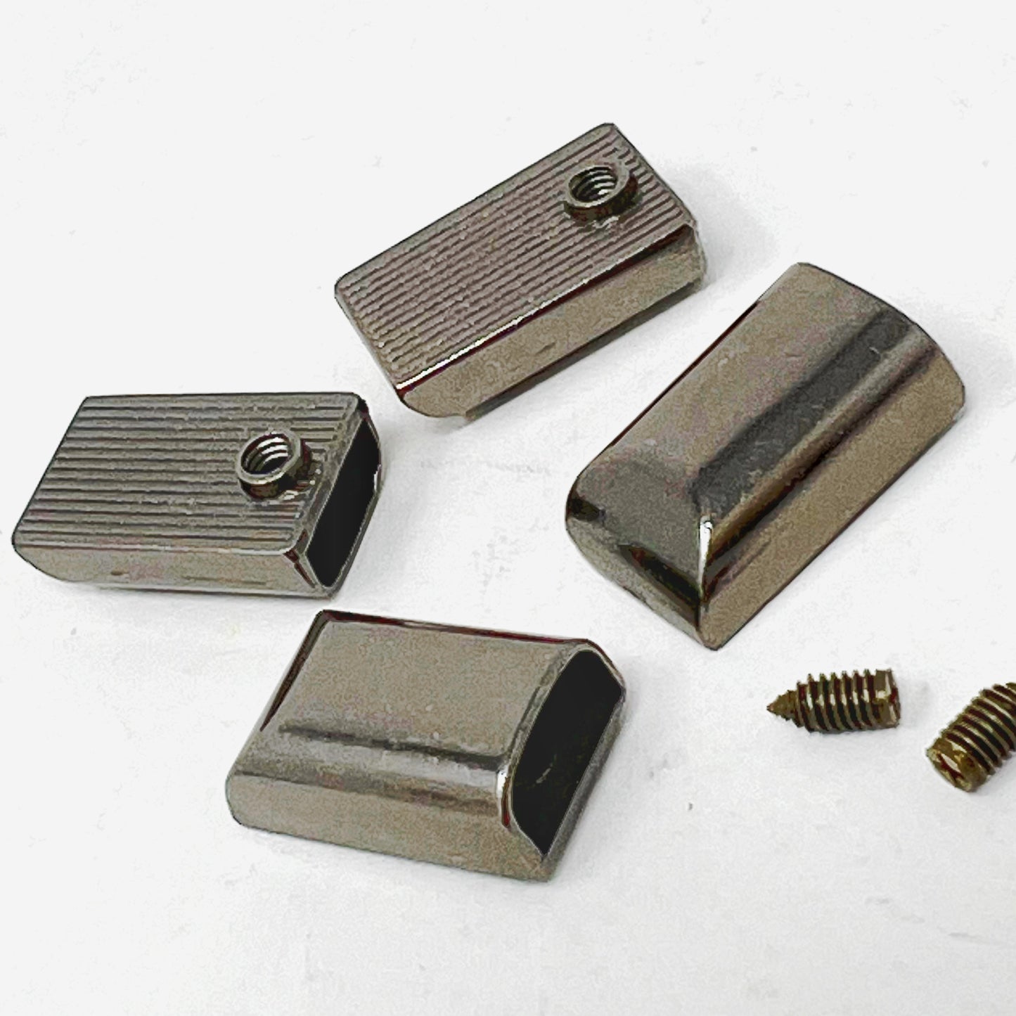 Zipper ends – Gunmetal. 11mm x 7mm