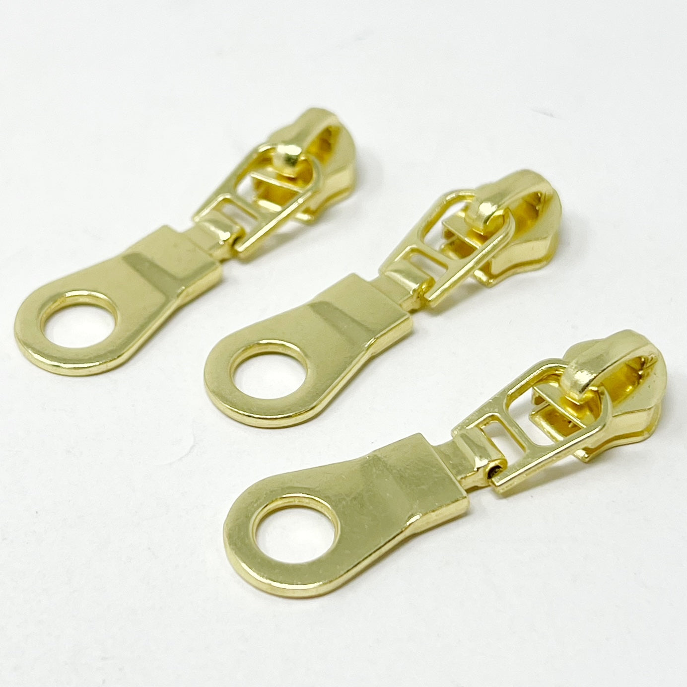 Donut Zip bright brass #5 Zip Slider