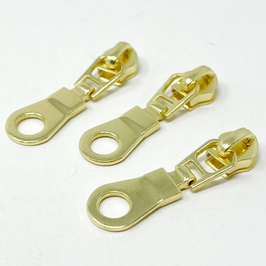 Doughnut Zip bright brass #5 Zip Slider