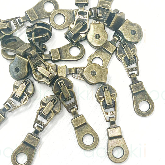 Zip Antique Brass #5 doughnut Zip Slider